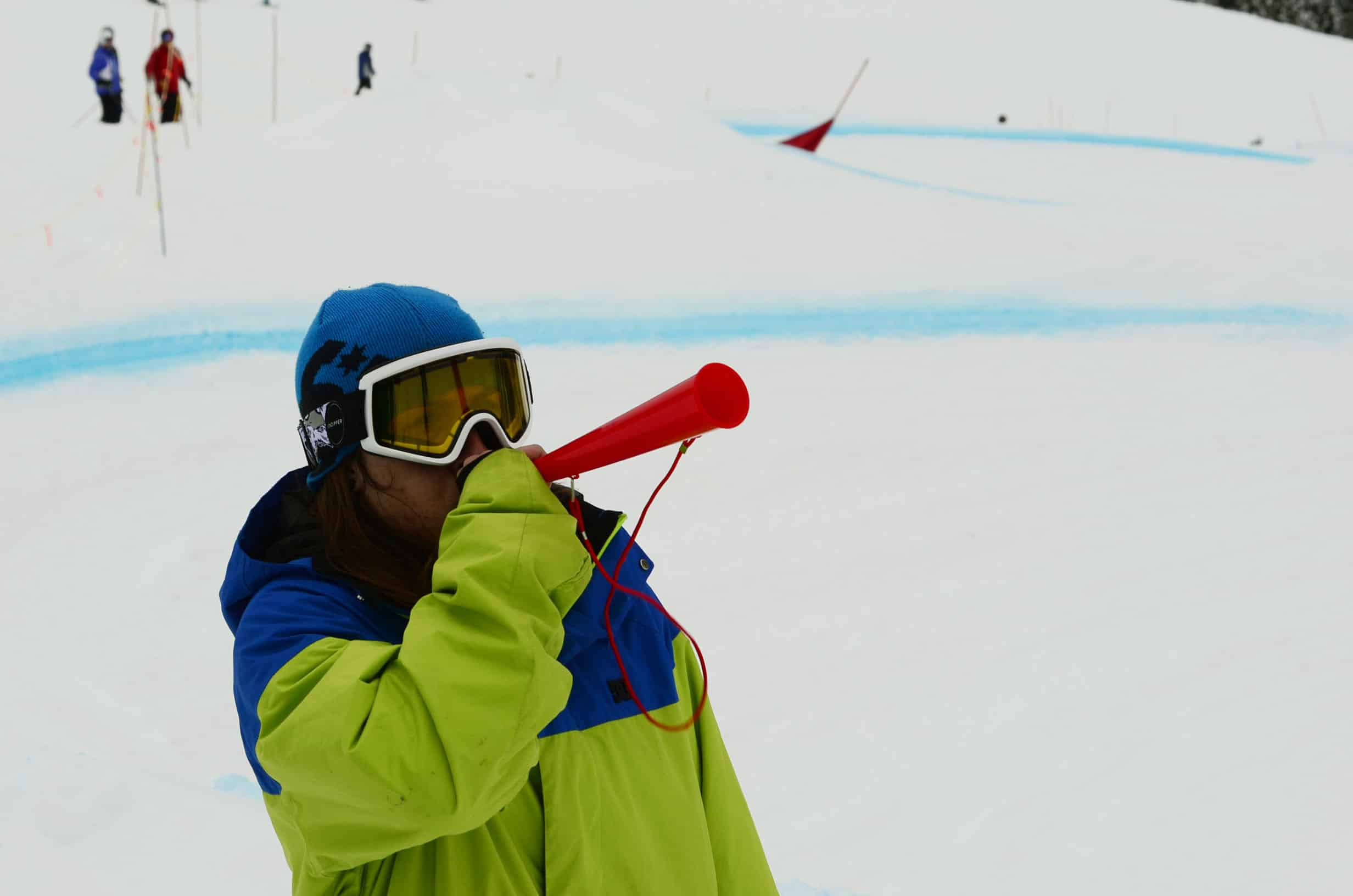 Cheering on the riders. "I love how obnoxious this horn is."