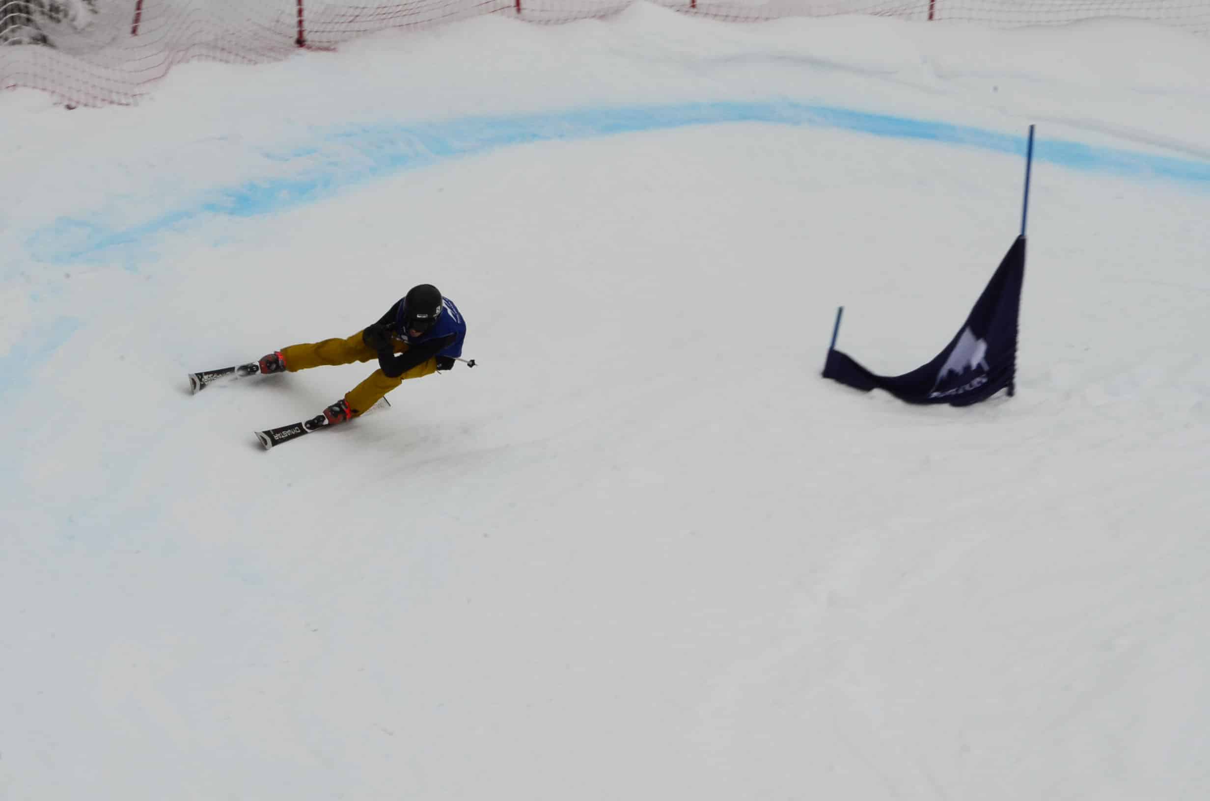Kieran Nikula flies through a corner on his way to capturing the men's open ski title.
