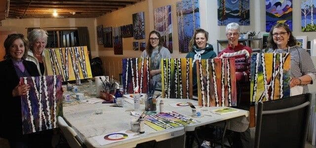 One of Derksen's classes shows off their completed projects. Photo Liz Derksen.