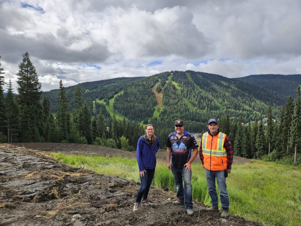 Left to right: Christina Antoniak, Jason White and Seth Worthen stand on the site of Sun Peaks' new ski cross course. Photo by Nicole Perry